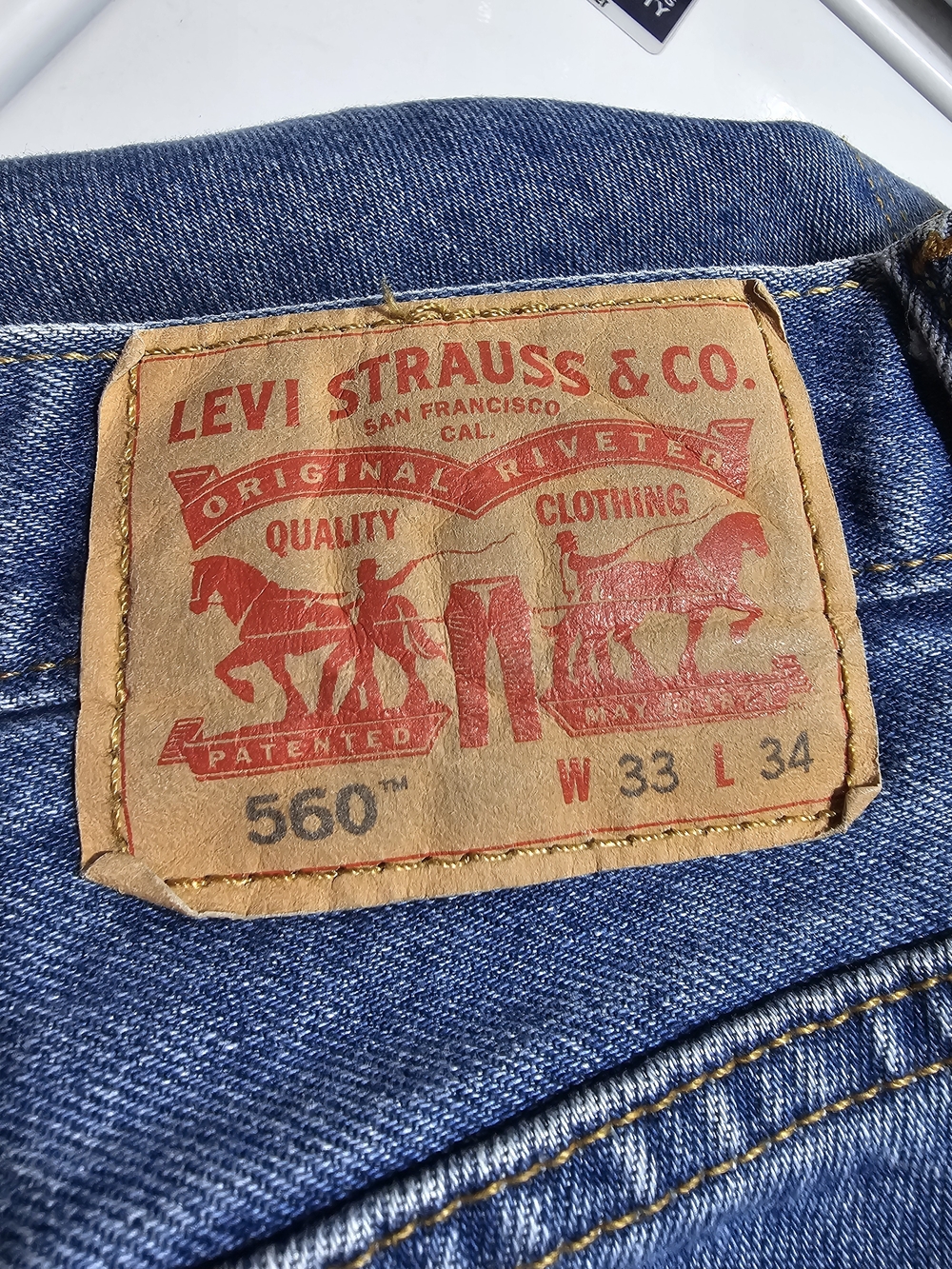 Levi's Relaxed Fit Men's Jeans in Blue with Tan Patch